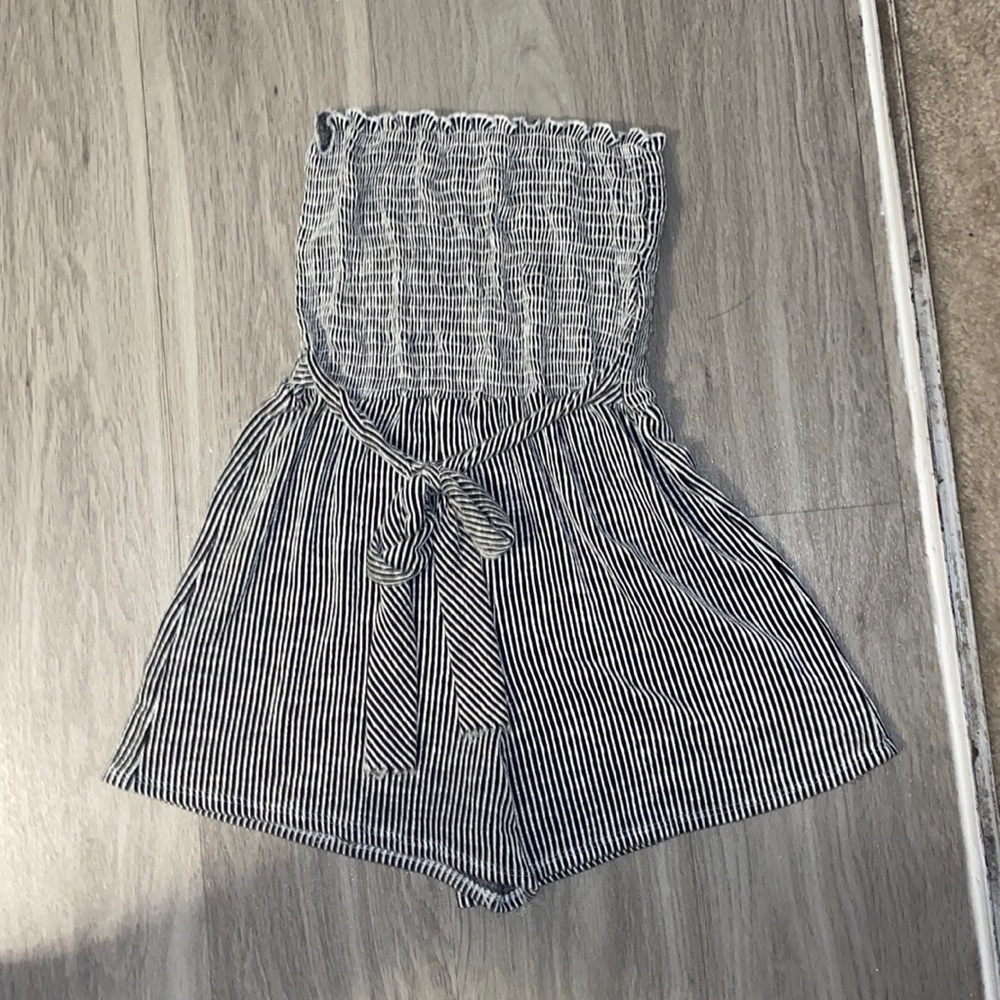 black and white romper with bow tie in front
